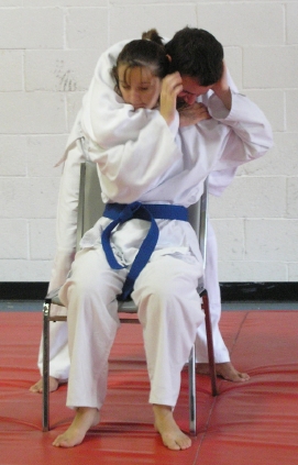 defending against an attack while seated